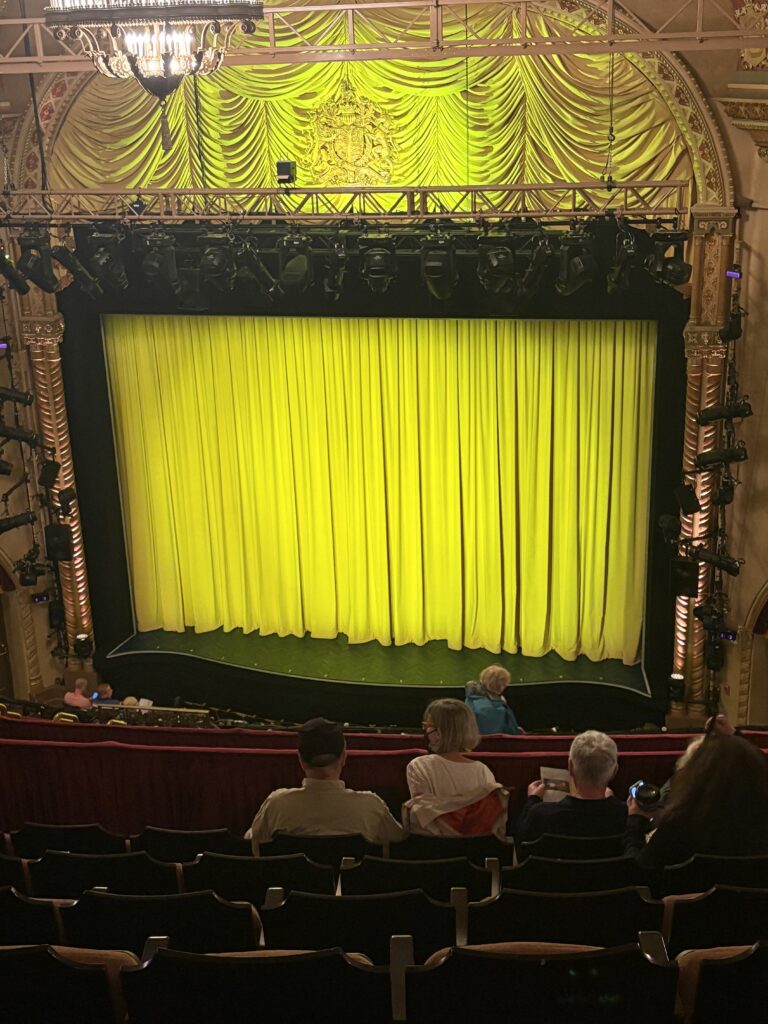 Waiting for the curtain to rise at the Golden Theatre